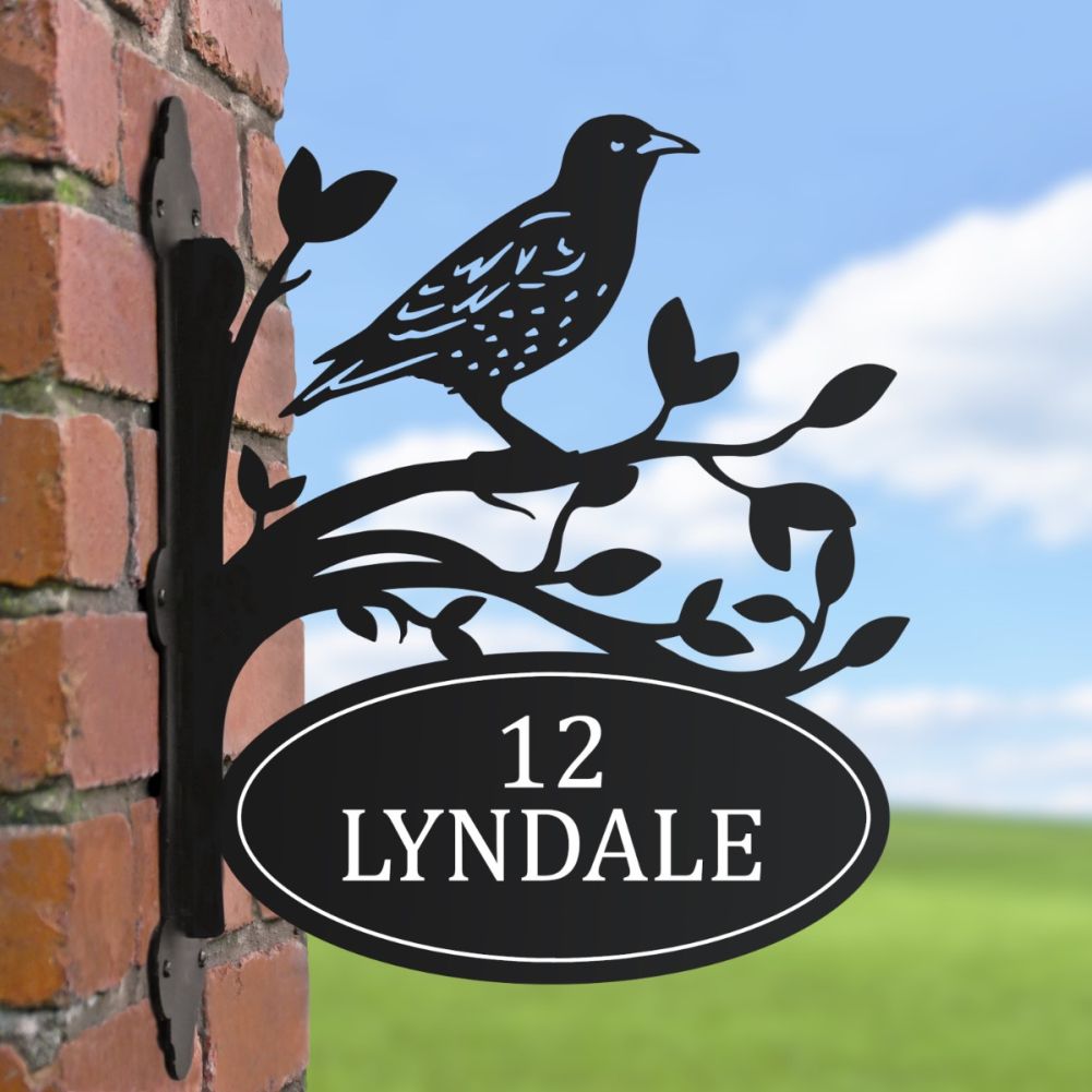 Starling Iron Bracket House Name Sign In A Blue Sky Setting
