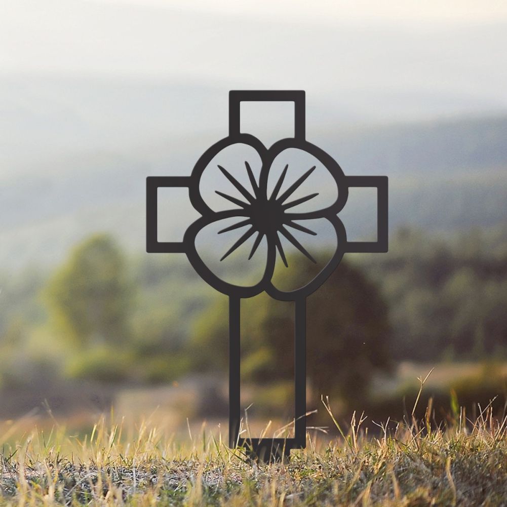 Steel Black Poppy & Cross Outline Ground Spike In A Countryside Setting