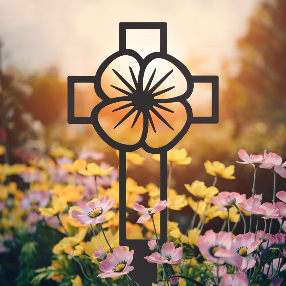 Steel Black Poppy & Cross Outline Ground Spike In A Sunset Setting