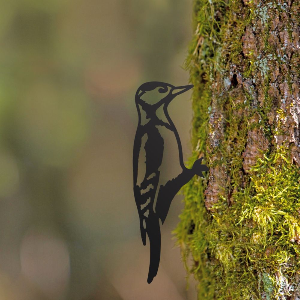 Steel Great Spotted Woodpecker Tree Spike In Black In A Woodland Setting