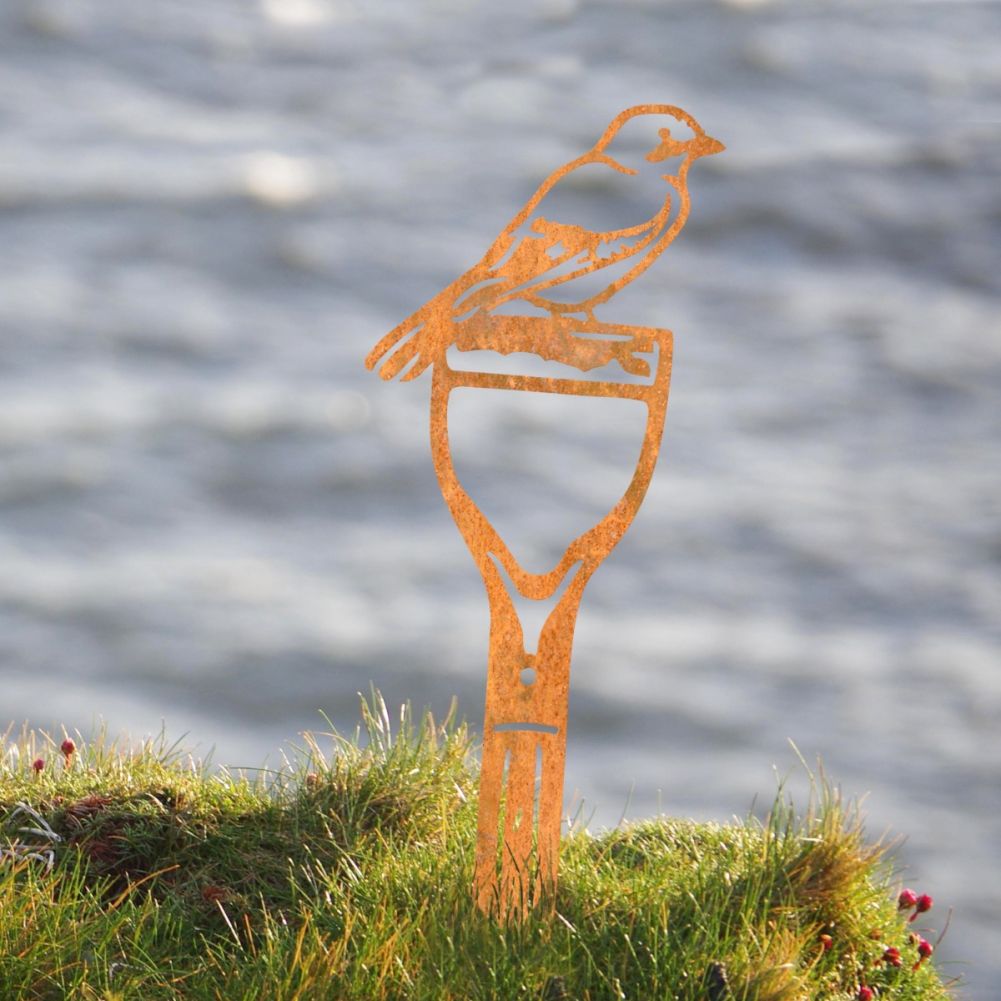Steel Jay Garden Silhouette in Rustic by a Body of Water