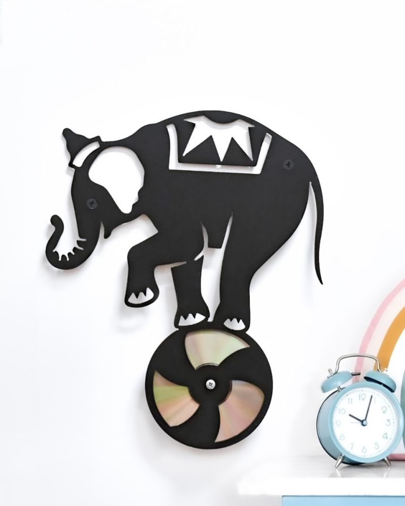 Steel Performing Elephant Recycled CD Black Wall Art on a Light Wall