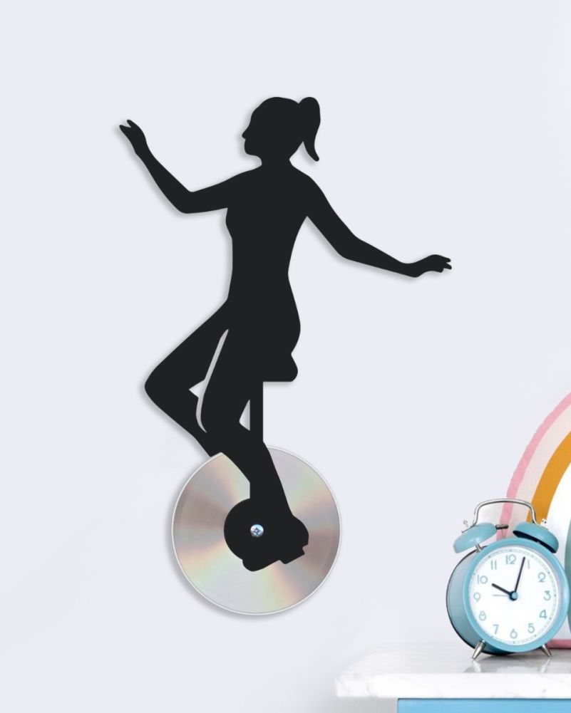 Steel Unicycle Recycled CD Black Wall Art on a Light Wall