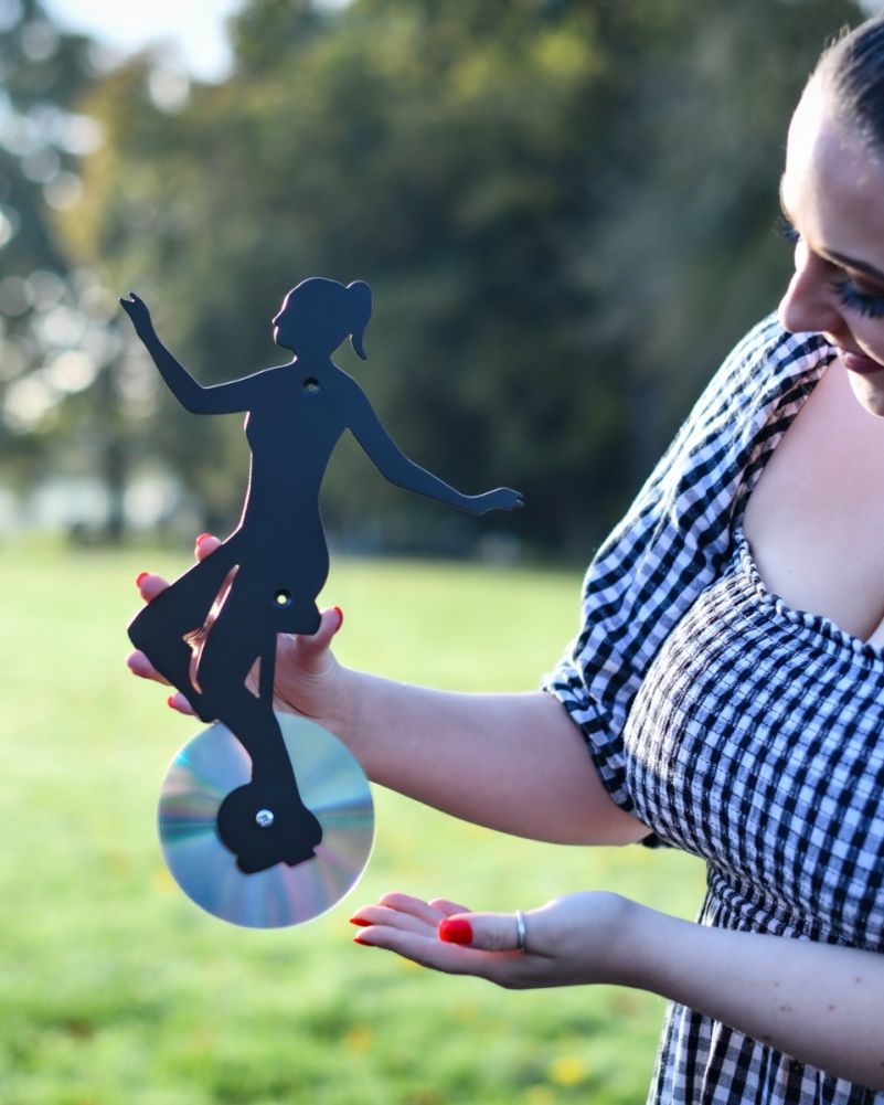Steel Unicycle Recycled CD Black Wall Art Scale Shot
