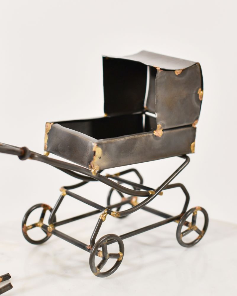 Scrap Metal Art Sculpture Close Up Of The Pram