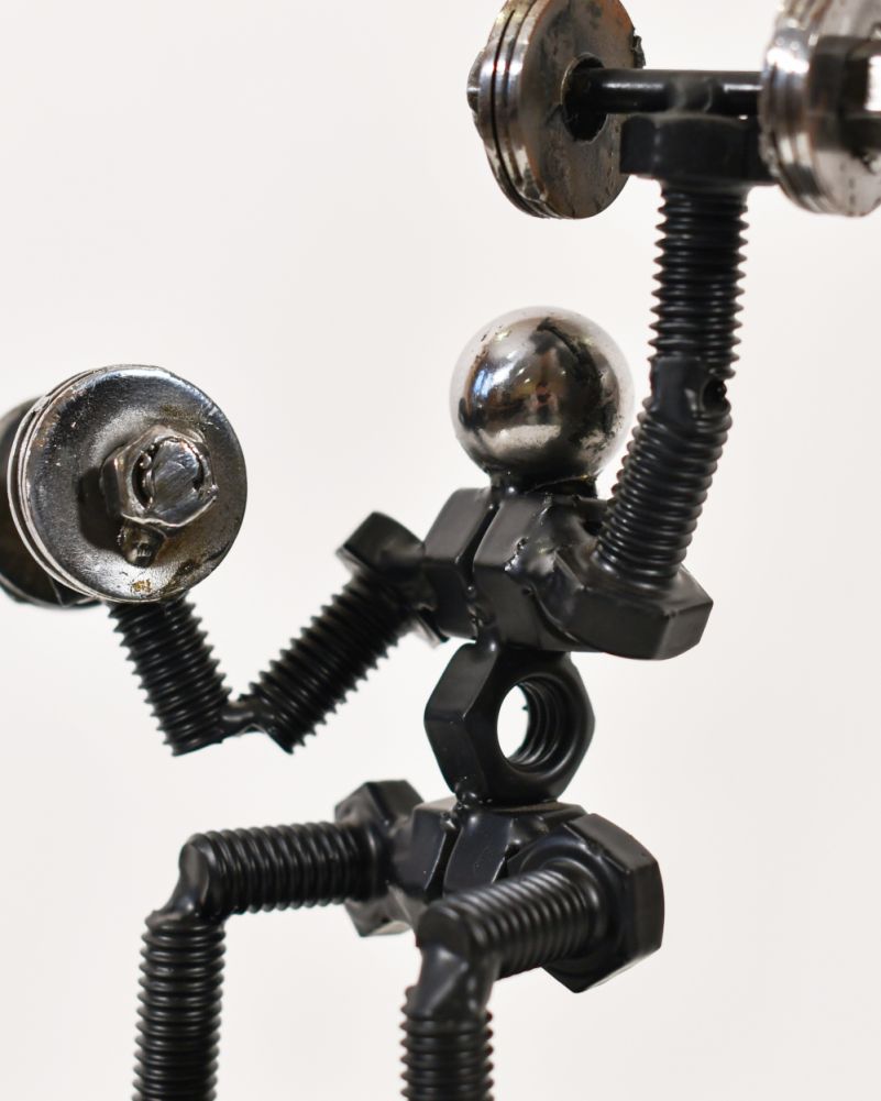 Close Up Of The The Shoulder Press Scrap Metal Art Sculpture