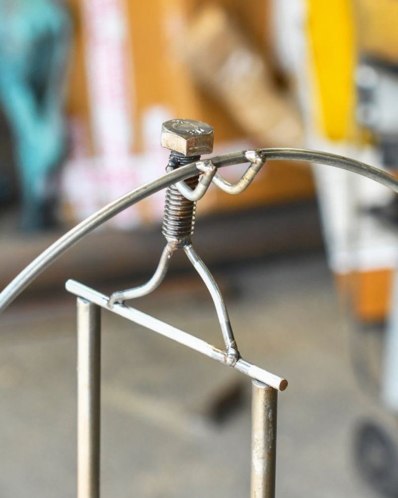 'The Tightrope Walker' Balancing Scrap Metal Art Sculpture Close Up