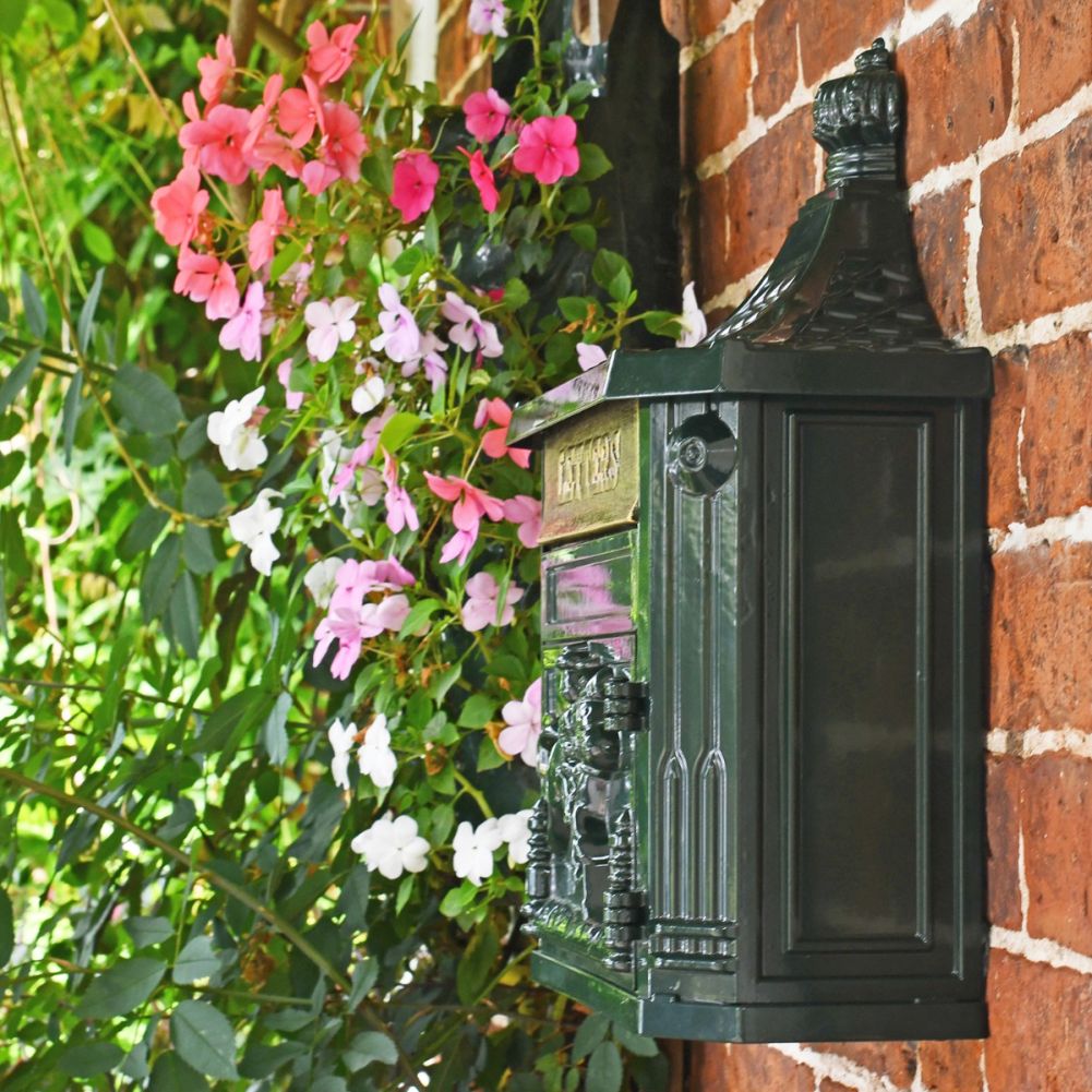 View of the Wall Mounted Post Box Mounted on a Brick wall