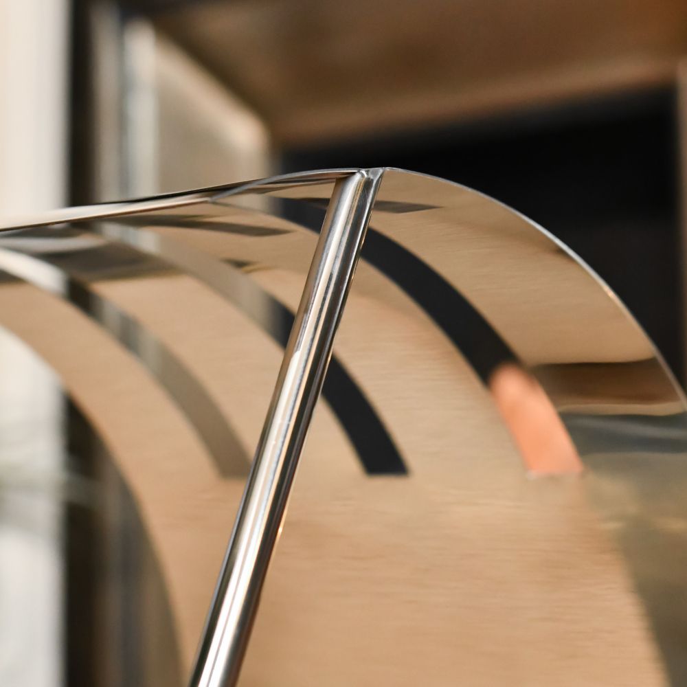 Close Up Of The Bright Chrome Art Deco 'Hampton' Log Holder