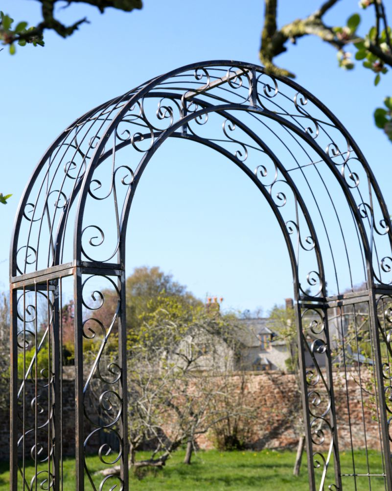 The Top Of The Traditional Ornate Stourhead Clear Lacquer Rose Arch