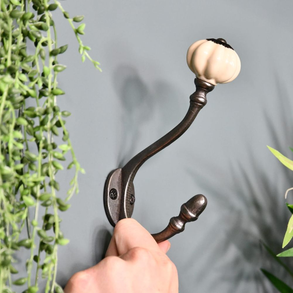 Ceramic Shell Tip Iron Coat Cook With Hand For Scale
