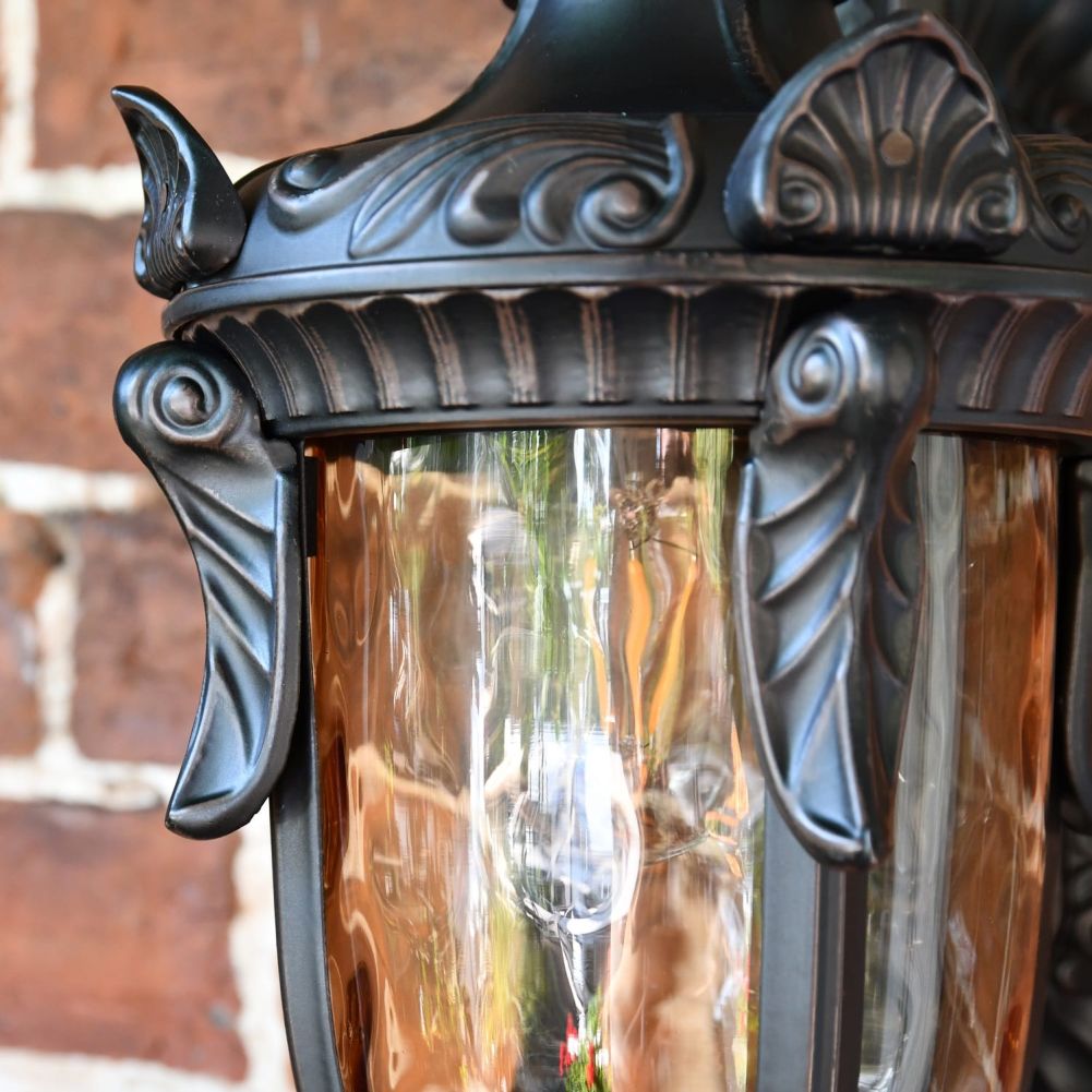 Close up of bevelled panes and decorative embellishments on lantern 