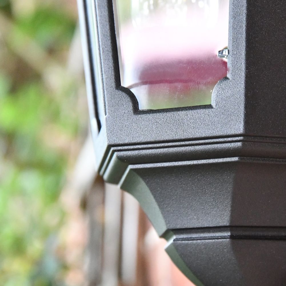 Close up of tiered lantern framework in black finish