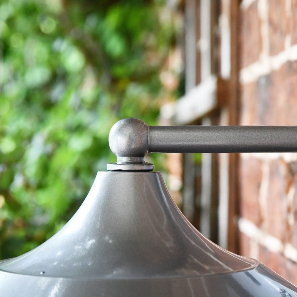 Close up of straight bracket with ball finial
