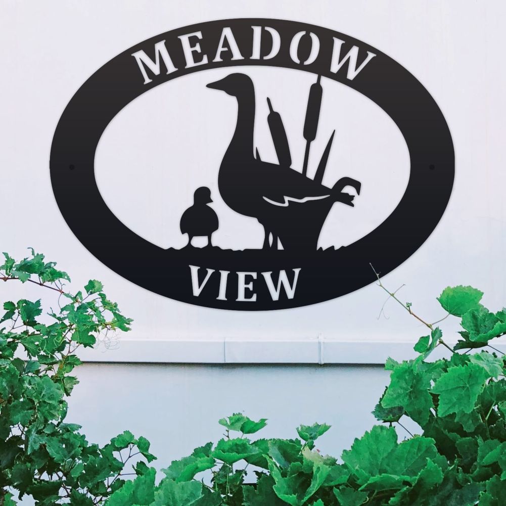 Geese Oval House Name Sign On a White Wall