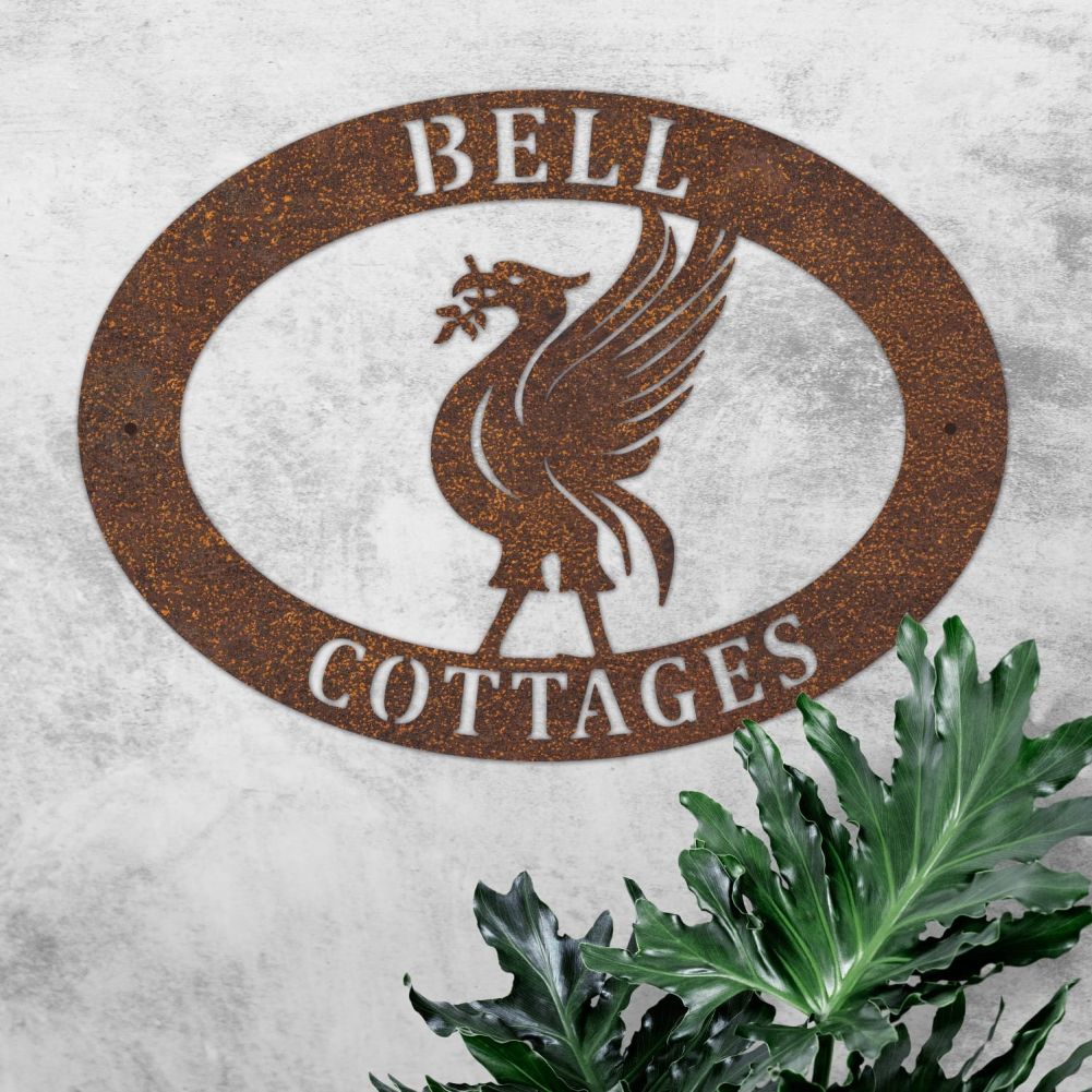 Rustic Liverbird Oval House Name Sign On a Rustic Wall