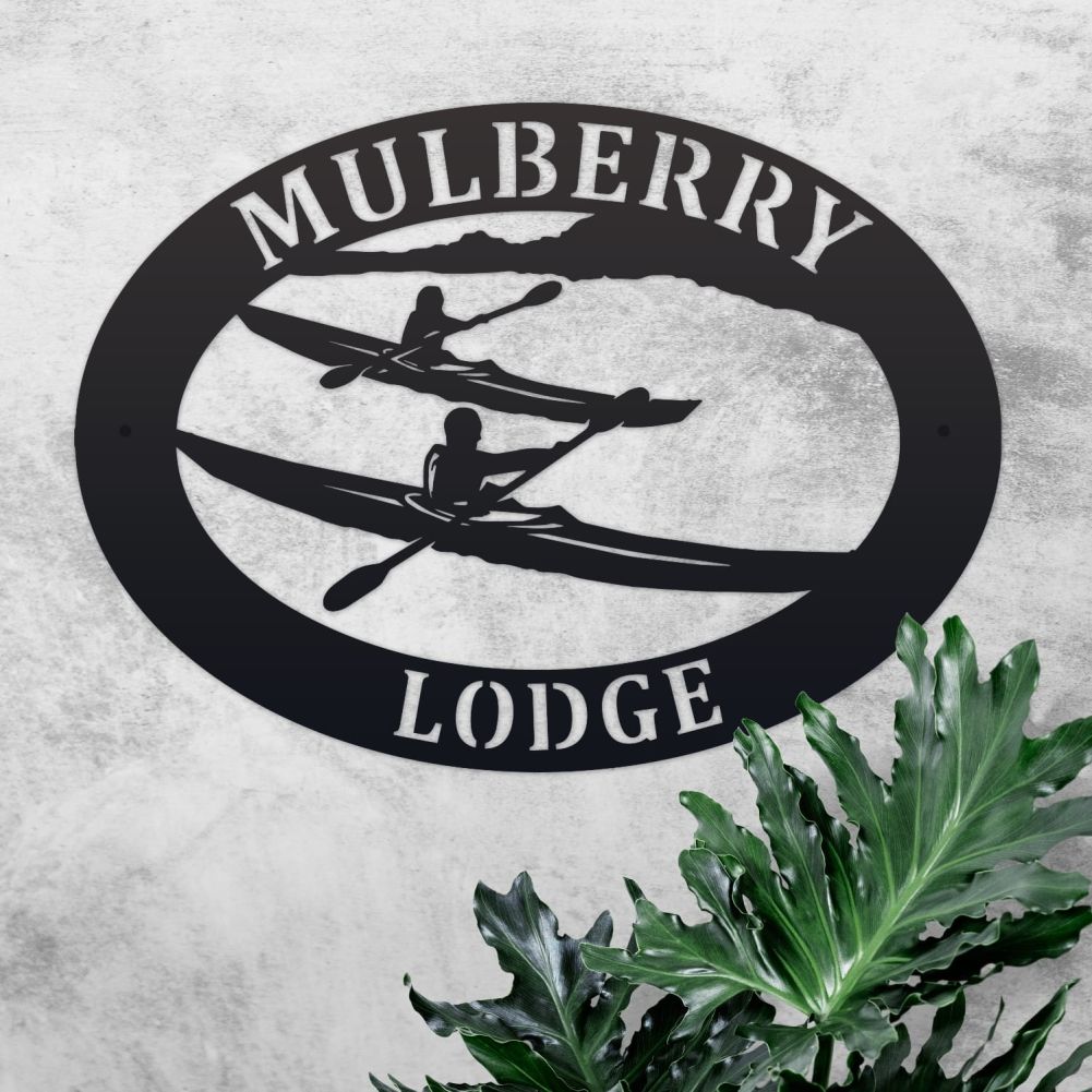 Kayak Oval House Name Sign On a Rustic Lodge