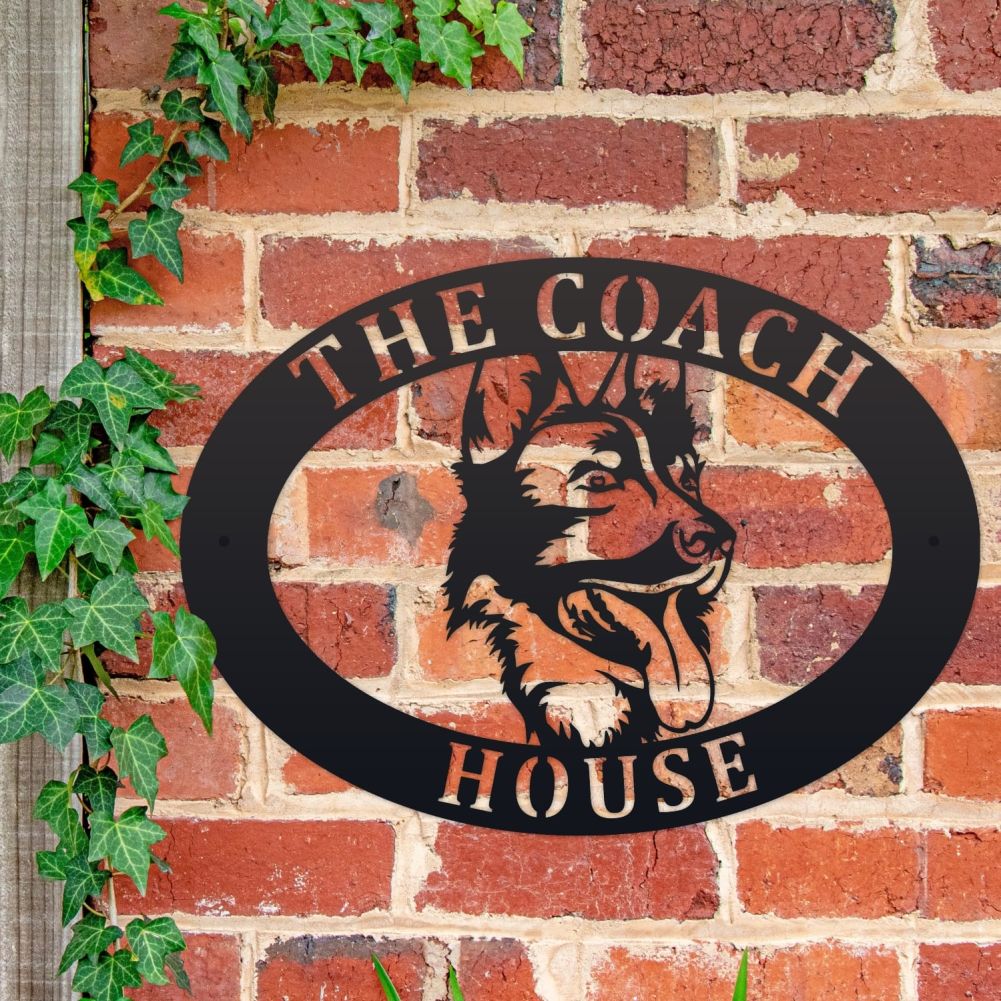 German Shepherd Oval House Name Sign On a Brick Wall