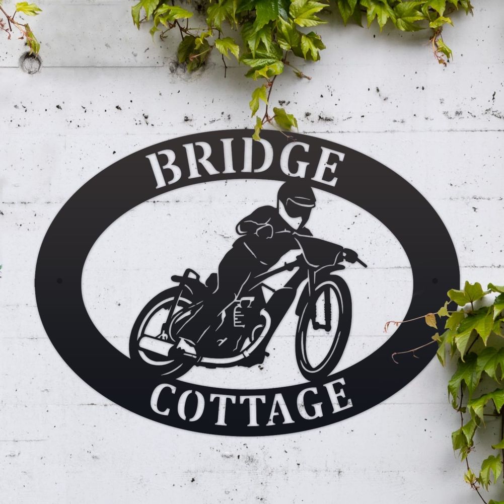 Speedway Oval House Name Sign On a White Brick Wall