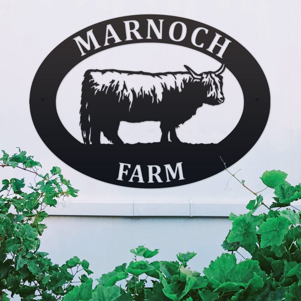 Highland Cow Oval House Name Sign On a White Wall