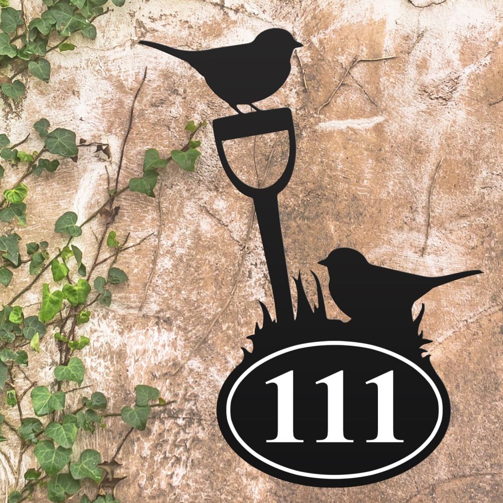 Robin Iron House Number Sign On A Rustic Wall