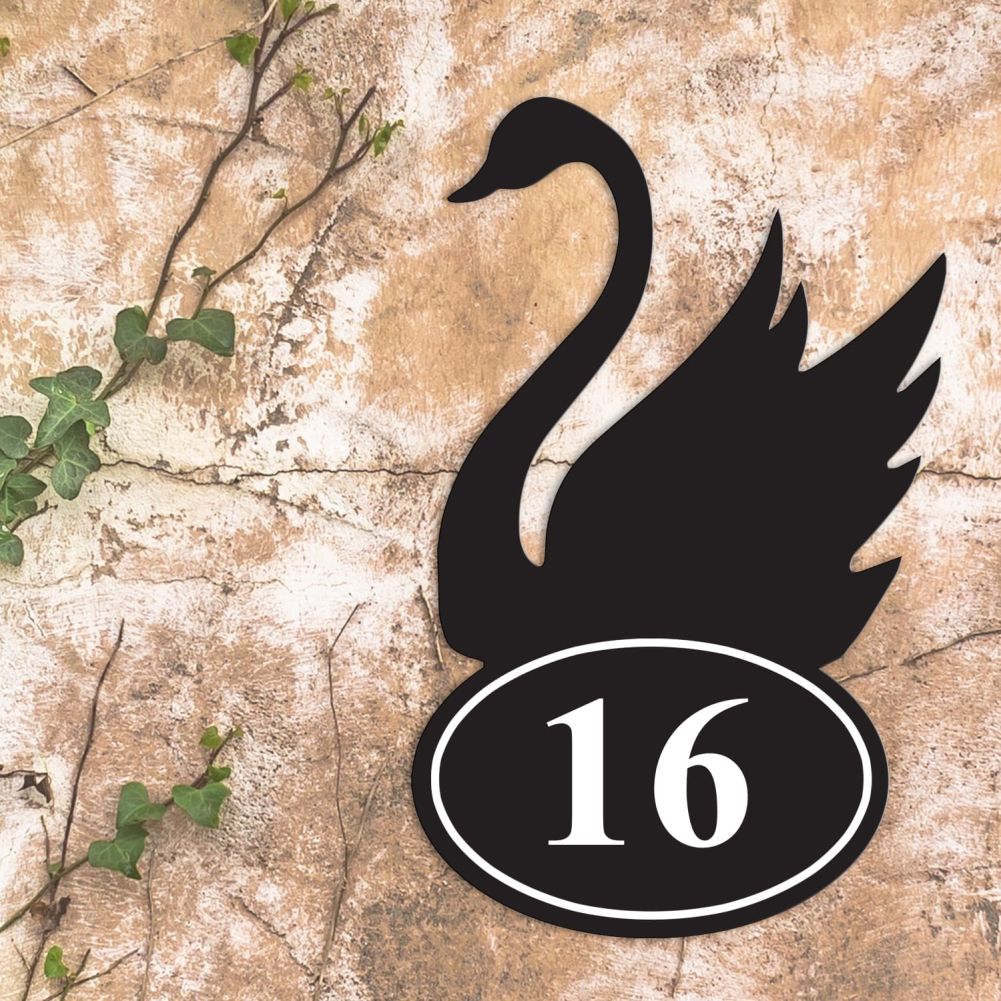 Swan Iron House Number Sign On a Rustic Wall