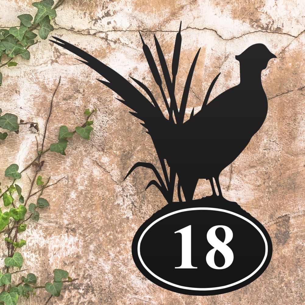 Pheasant Iron House Number Sign On a Rustic Wall