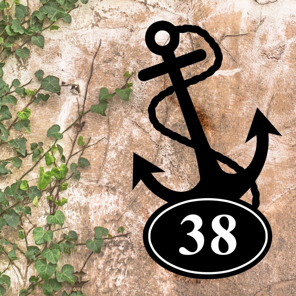 Anchor Iron House Number Sign On a Rustic Wall