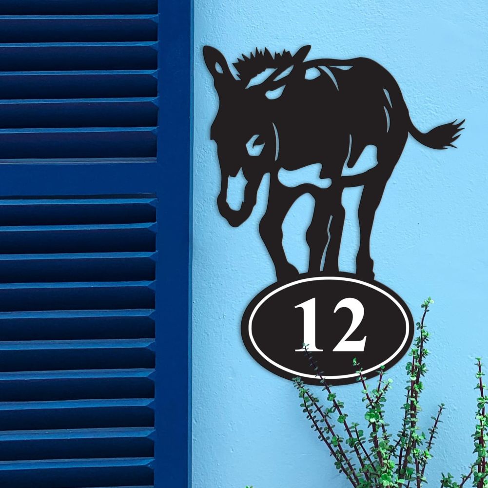 Donkey Iron House Number Sign On a Blue Wall
