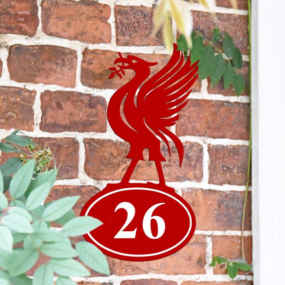 Liver Bird Iron House Number Sign On a Brick Wall