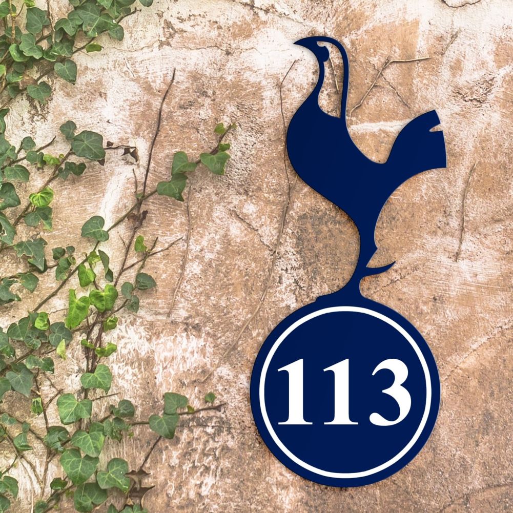Contemporary Cockerel Iron House Number Sign On a Rustic Wall