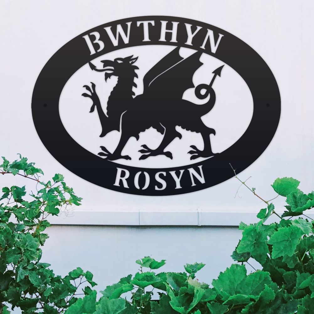 Welsh Dragon Oval House Name Sign On a White Wall