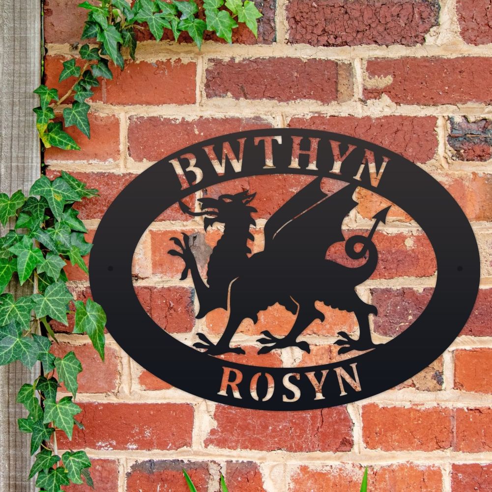 Welsh Dragon Oval House Name Sign On a Brick Wall