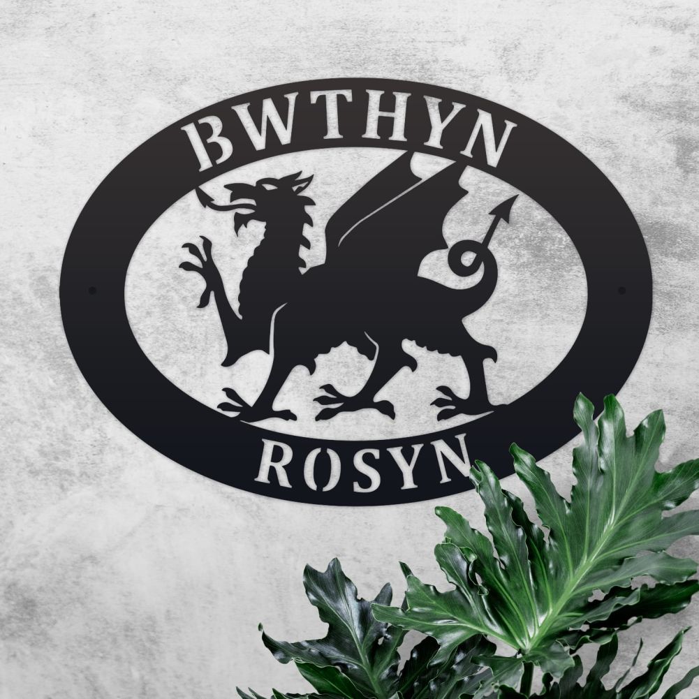 Welsh Dragon Oval House Name Sign On a Rustic Wall
