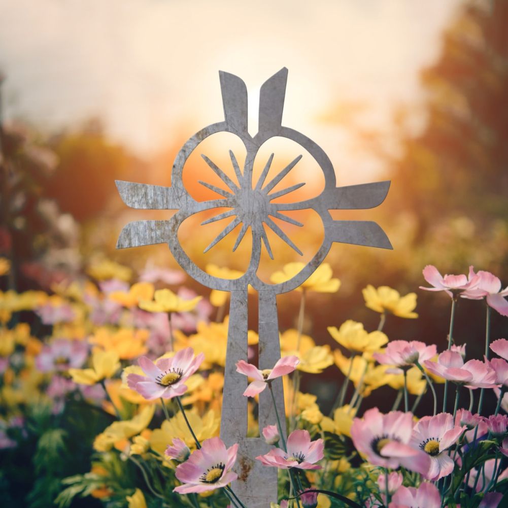 Unfinished Steel Poppy & Cross Ground Spike In A Sunny Setting