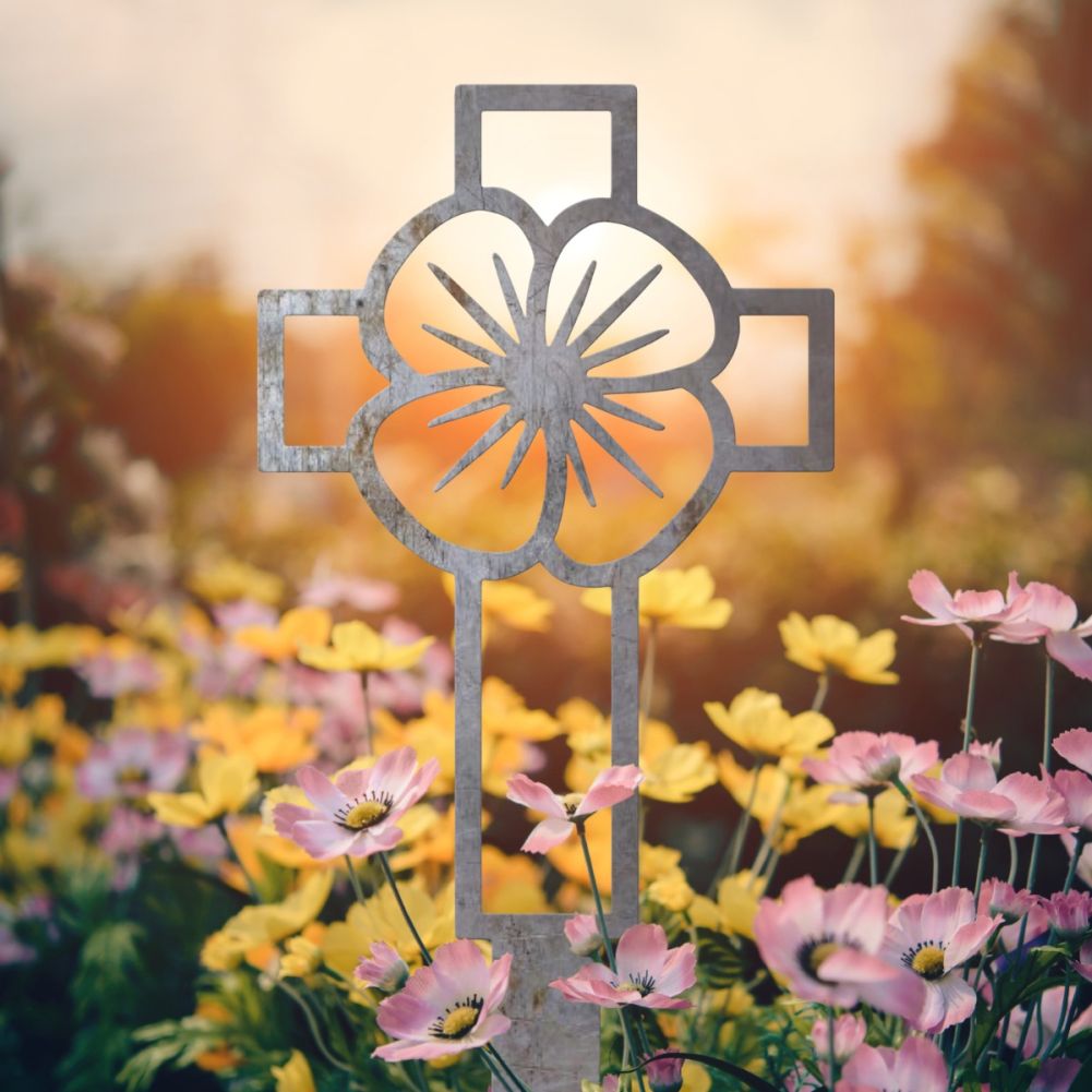 Unfinished Steel Poppy & Cross Outline Ground Spike In A Sunny Setting