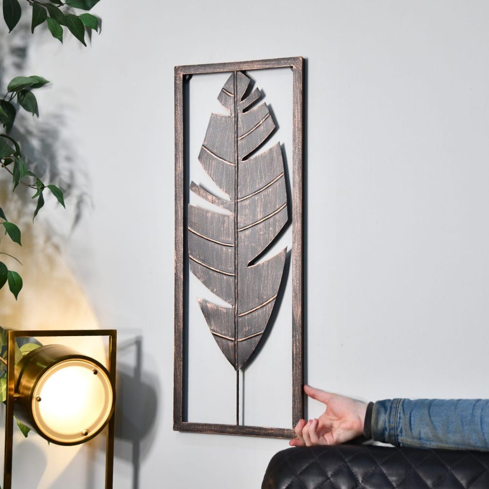 Antique Bronze Feather Wall Art in Frame With Hand For Scale
