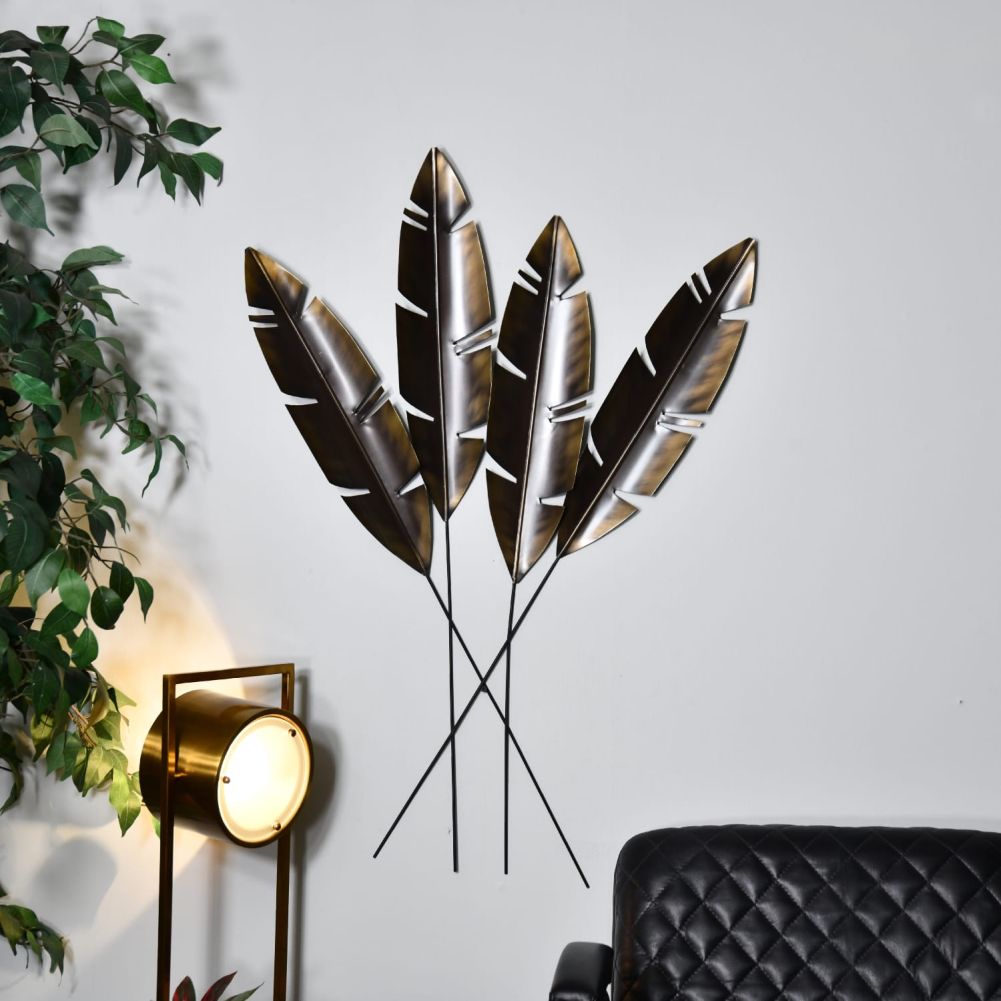 Antique Bronze Feathers Wall Art In a Living Room