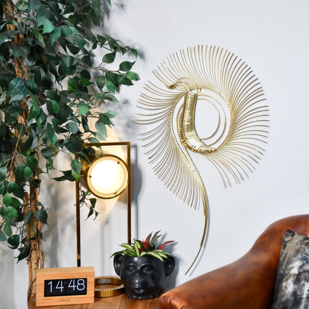 Gold Stylised Peacock Wall Art In a Living Room