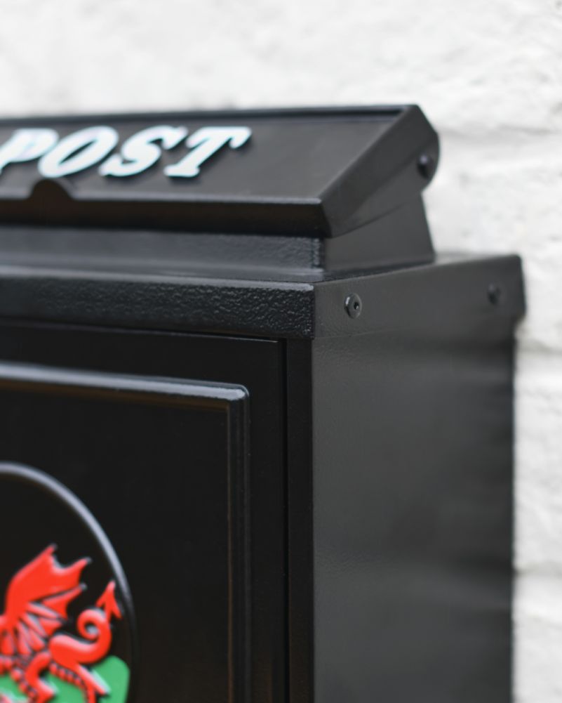 Welsh Dragon Motif Black Wall Mounted Post Box Close Up Of The Quality steel Edges
