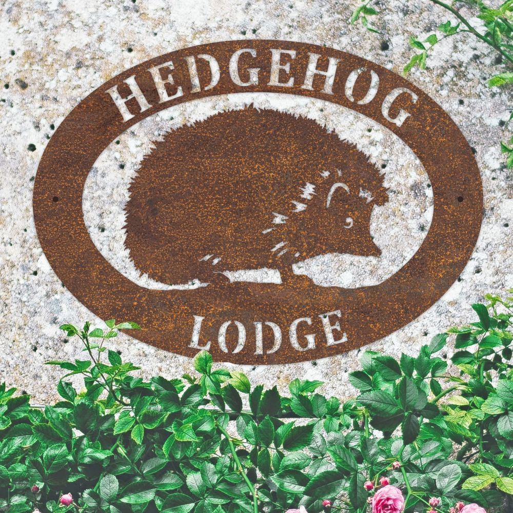 Rustic Hedgehog Oval House Name Sign On a Granite Wall