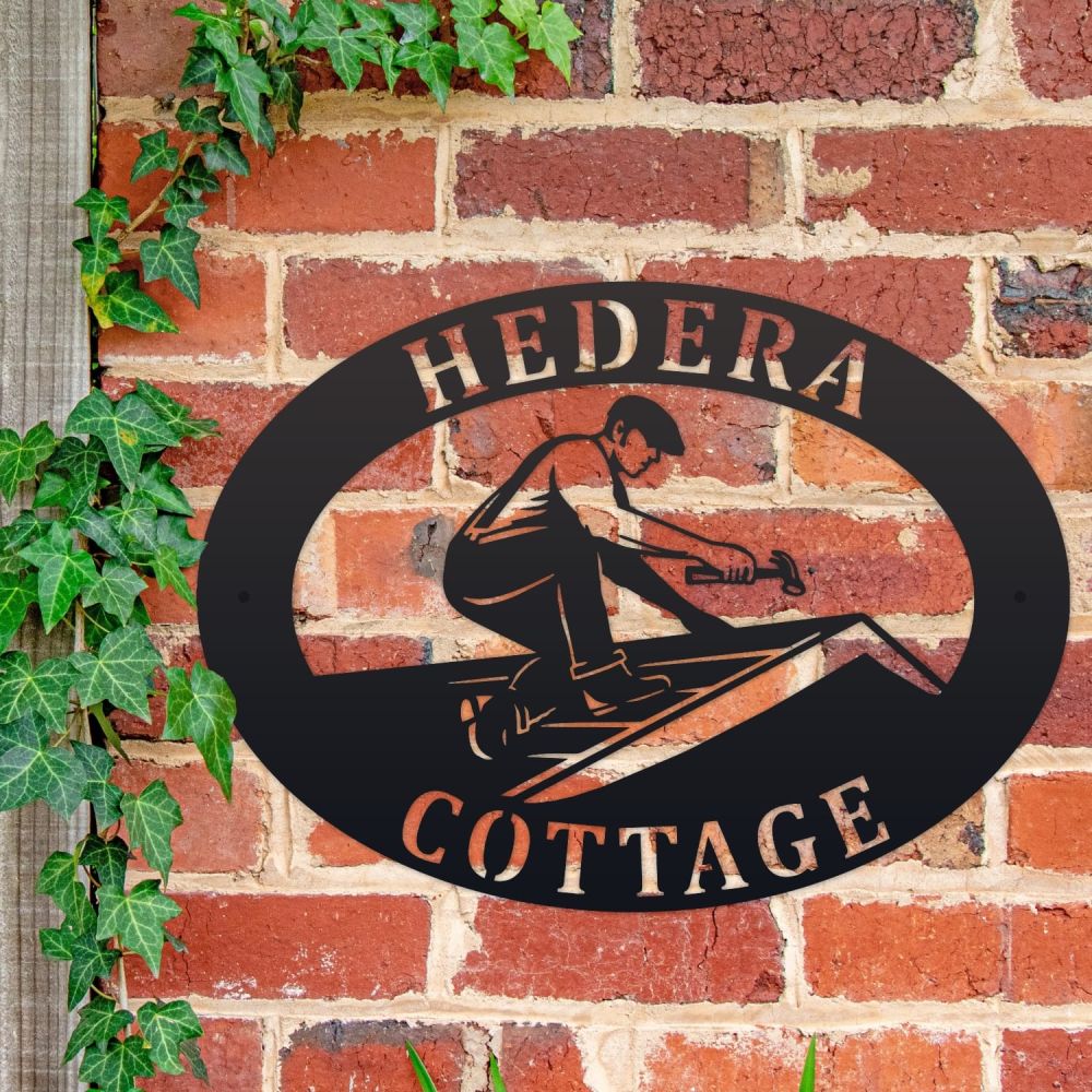 Roofer Oval House Name Sign On a Brick Wall