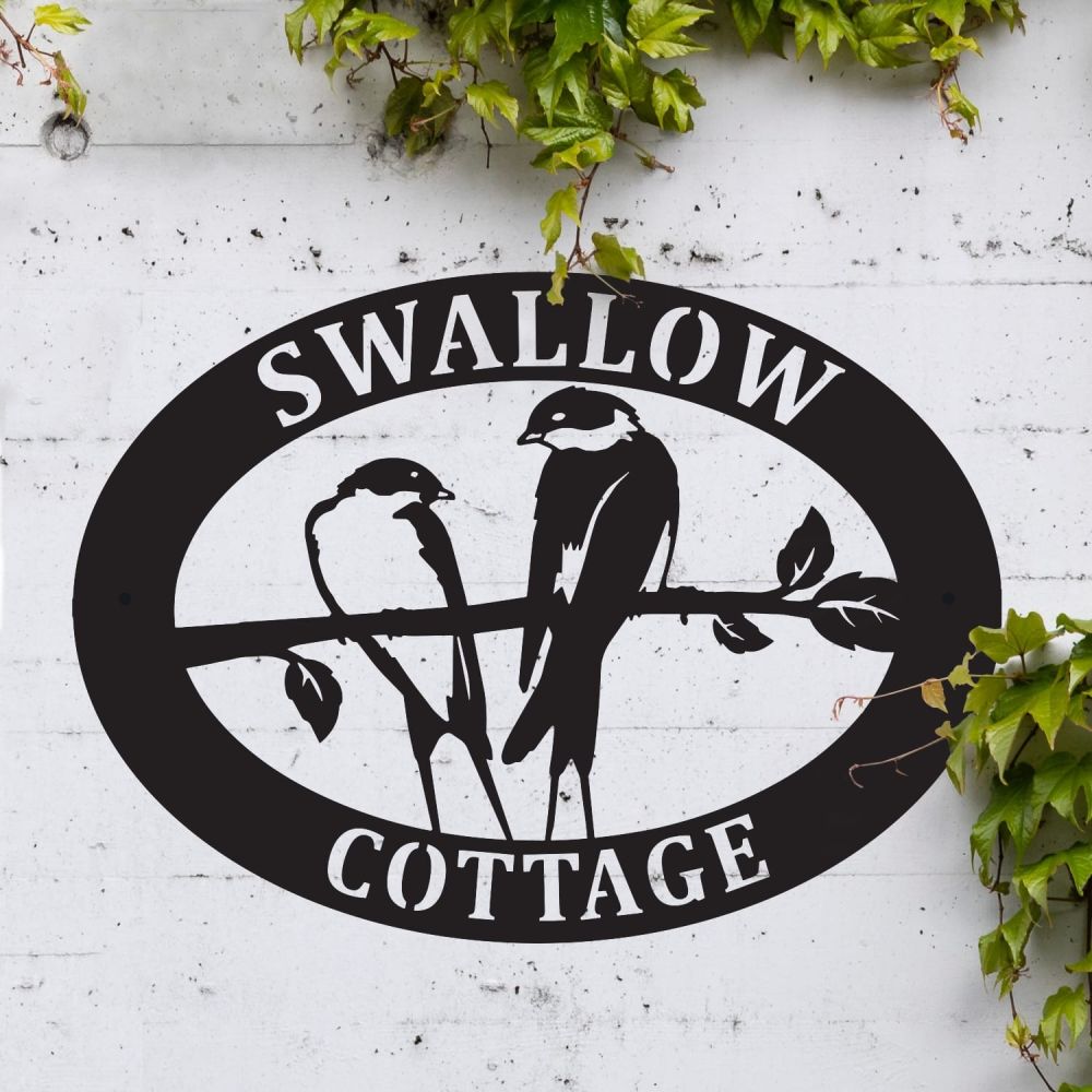 Swallow Oval House Name Sign On a White Brick Wall