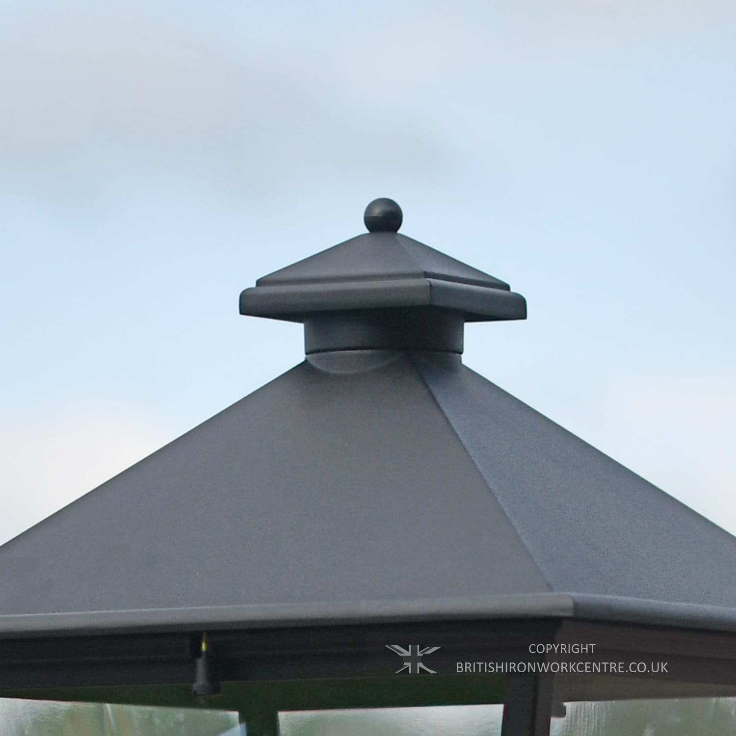 Close Up of Finial On Black Simplistic Victorian Pillar Lantern