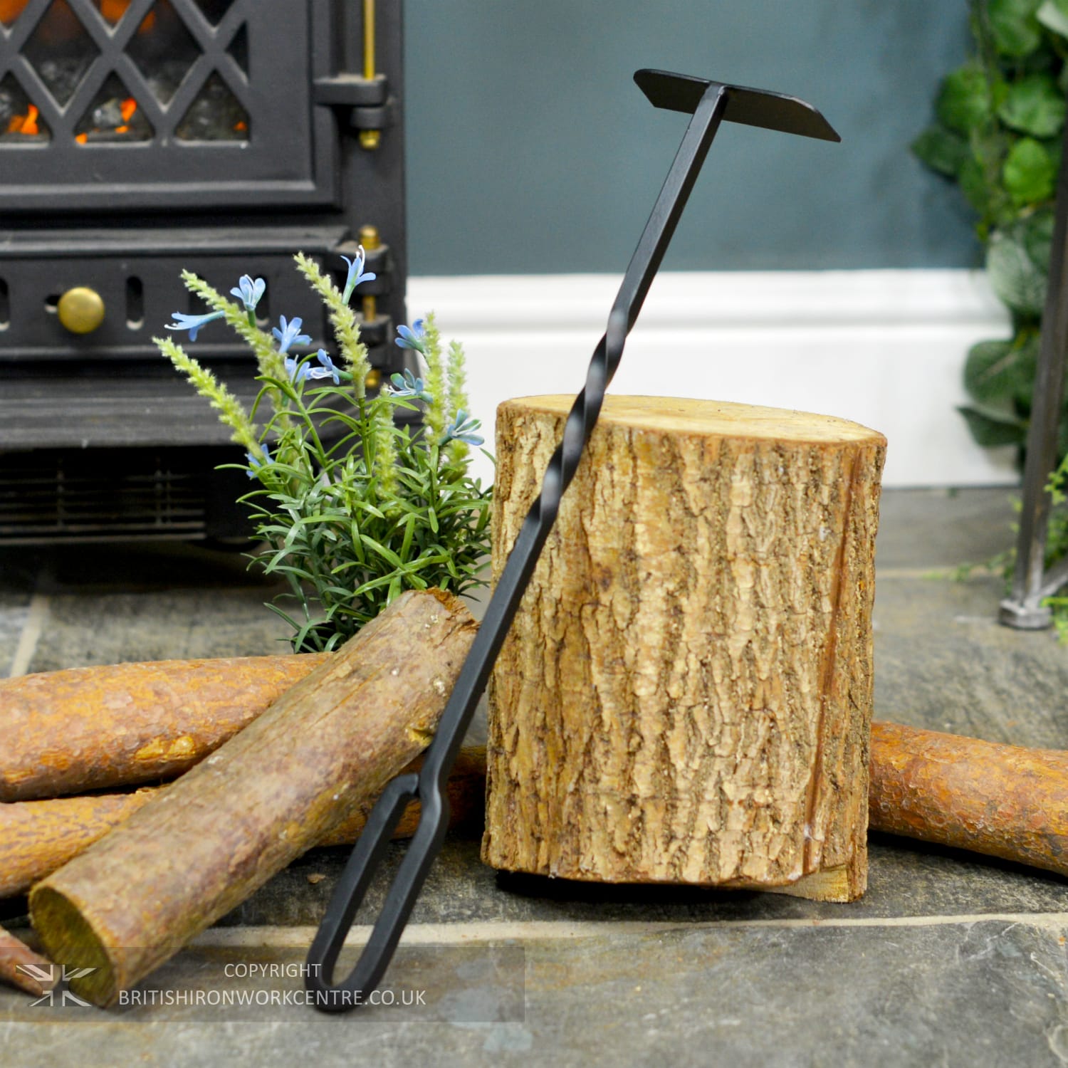 Blacksmith Twist Fireplace Ash Scraper In Living Room Setting