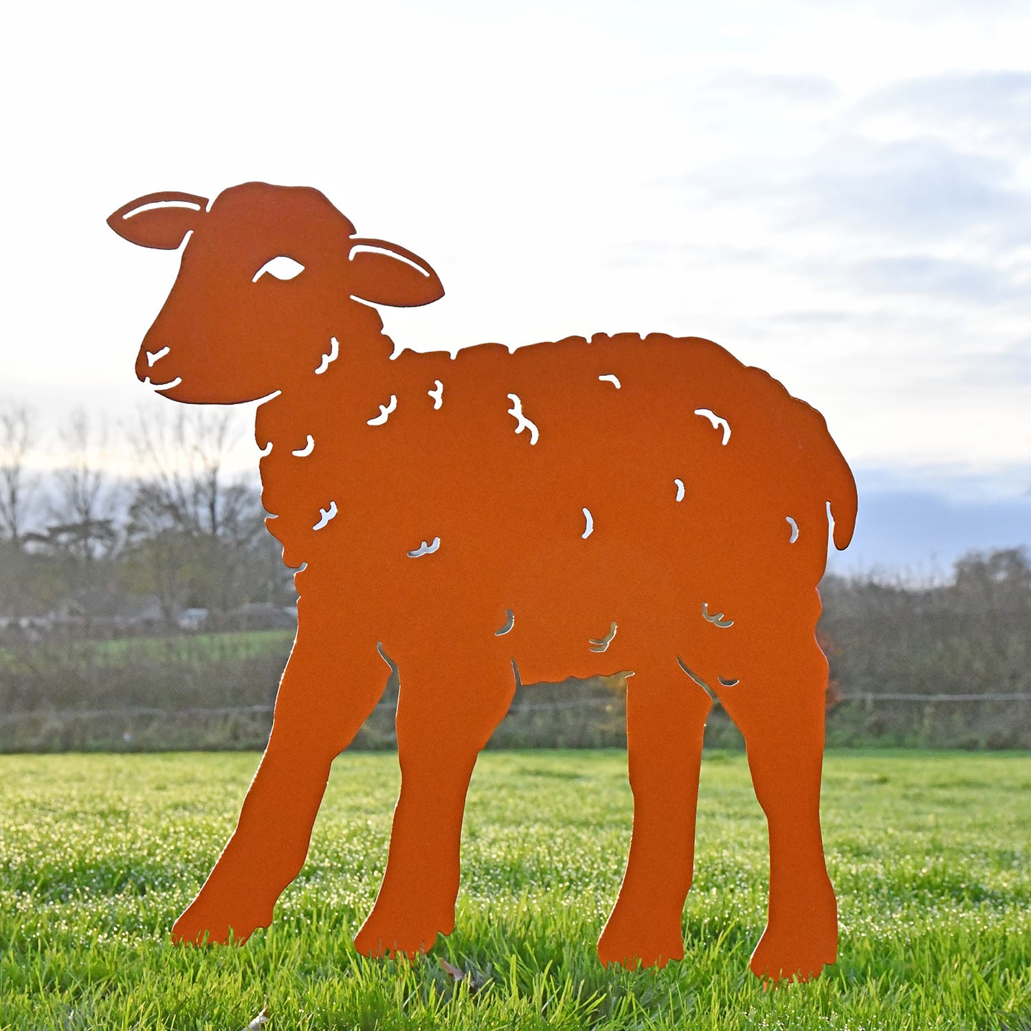 Orange Curly Lamb Iron Silhouette Looking Left
