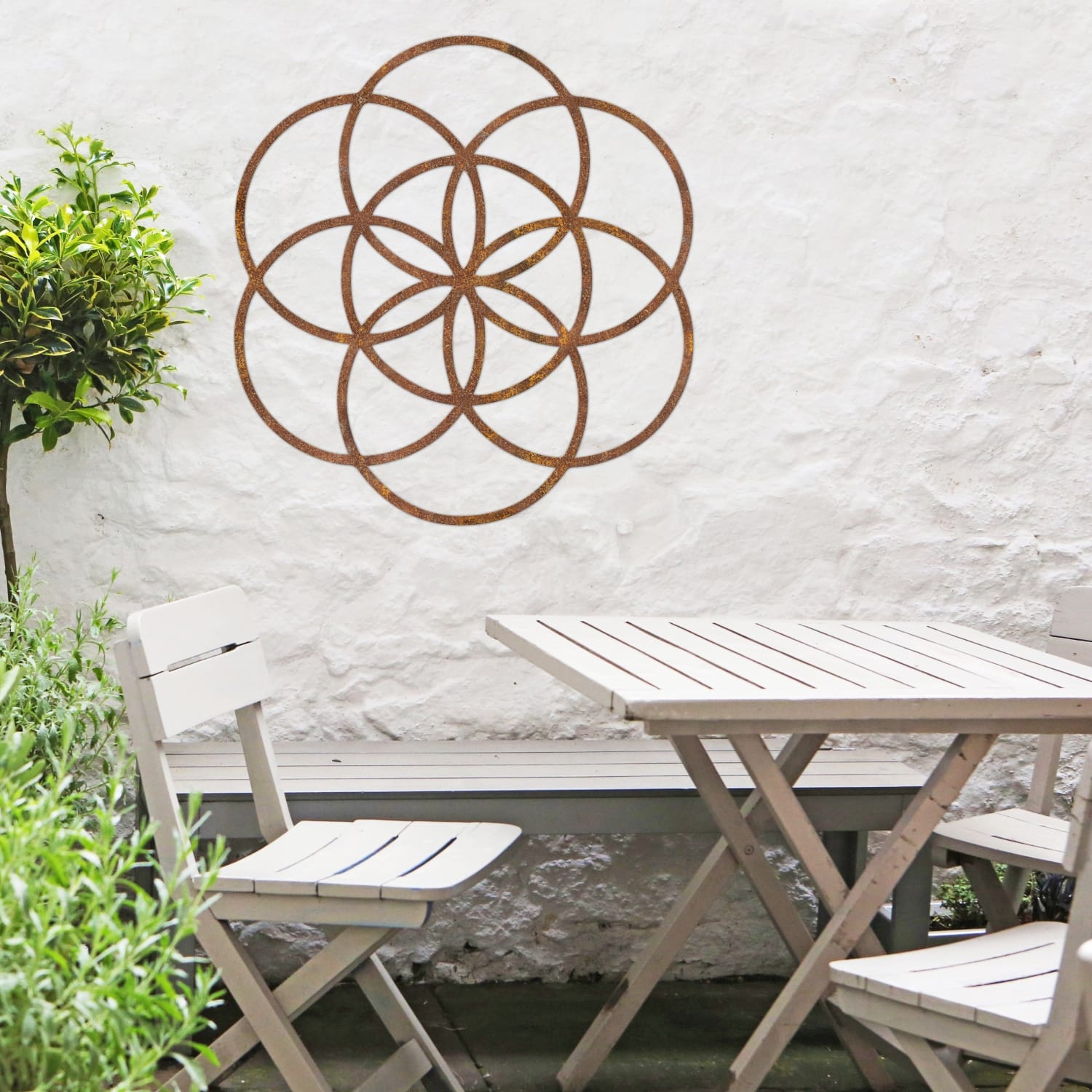 Rustic "Seed of Life" Steel Wall Art With Outdoor Furniture
