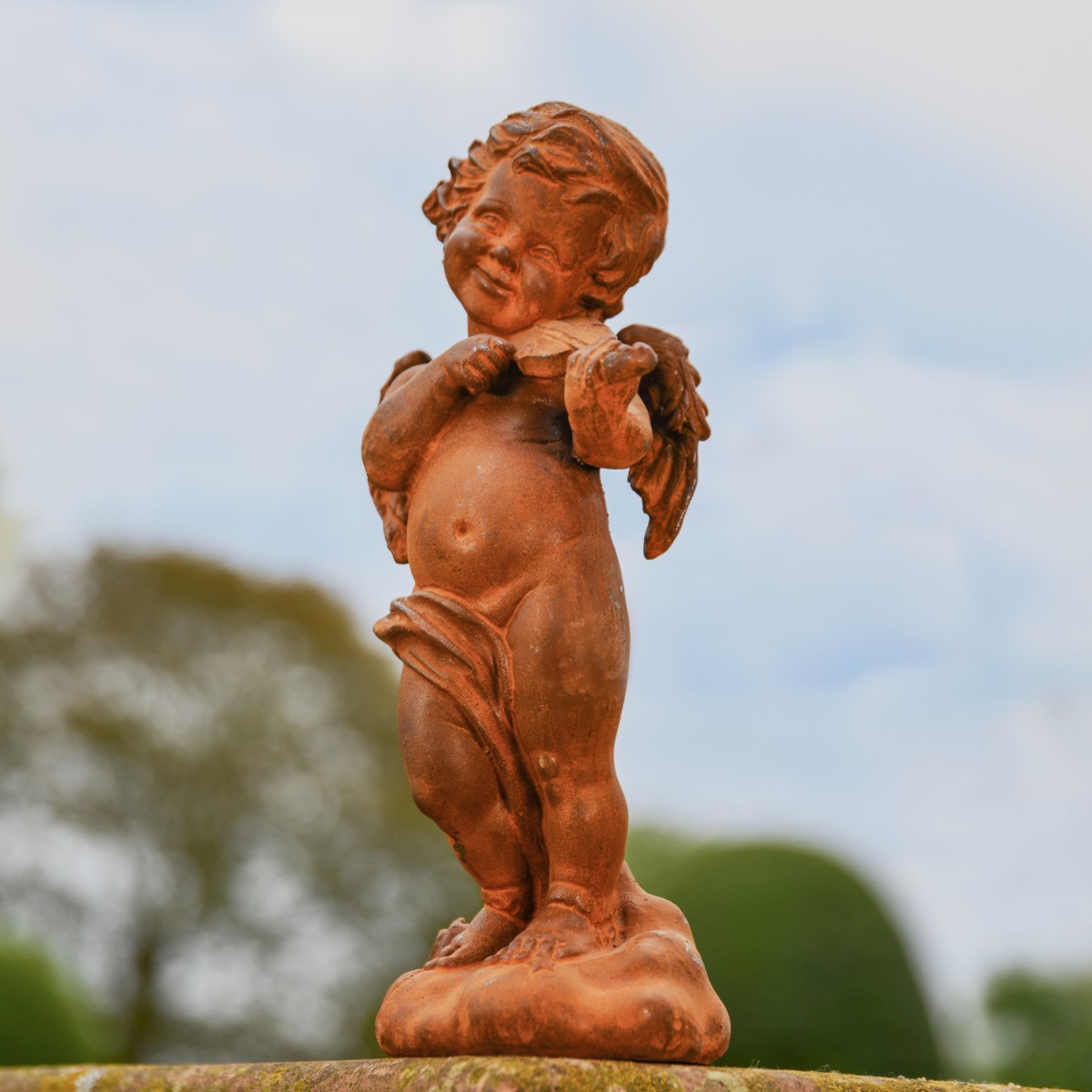 Cherub Playing A Violin Cast Iron Rustic Sculpture