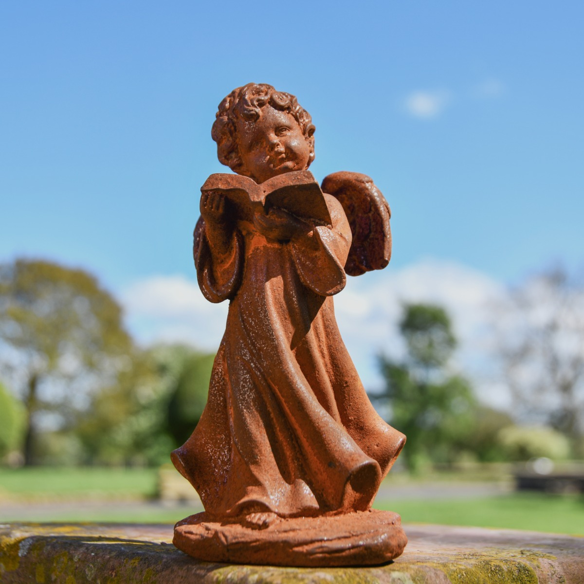 Cherub Reading Cast Iron Rustic Sculpture