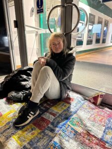 Woman With Our Survival Blanket
